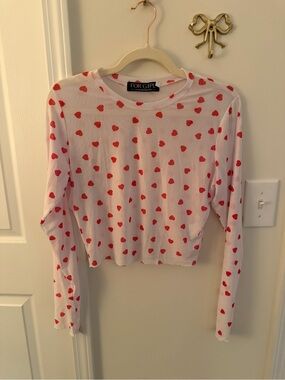 Cropped white and red heart mesh long sleeve top